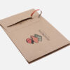 Bedruckte KRAFTMAILER® light Versandtasche mit Logodruck und geöffnetem Aufreißfaden