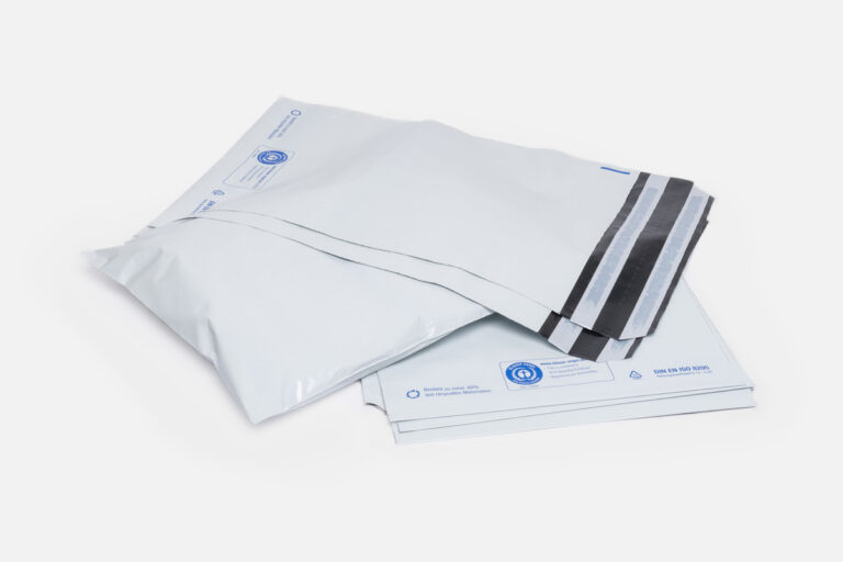 Several ECOMAILER® mailing bags with the Blue Angel eco-label, stacked