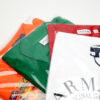 Bunte Poloshirts in Polybags Premium Textilverpackungen