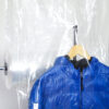 Tear-off hood packaging device for hanging garments