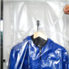 Tear-off hood packaging device for hanging garments