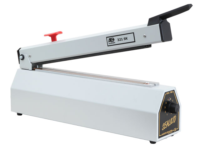 Impulse heat sealer with integrated cutting blade Impulse heat sealer with integrated cutting blade
