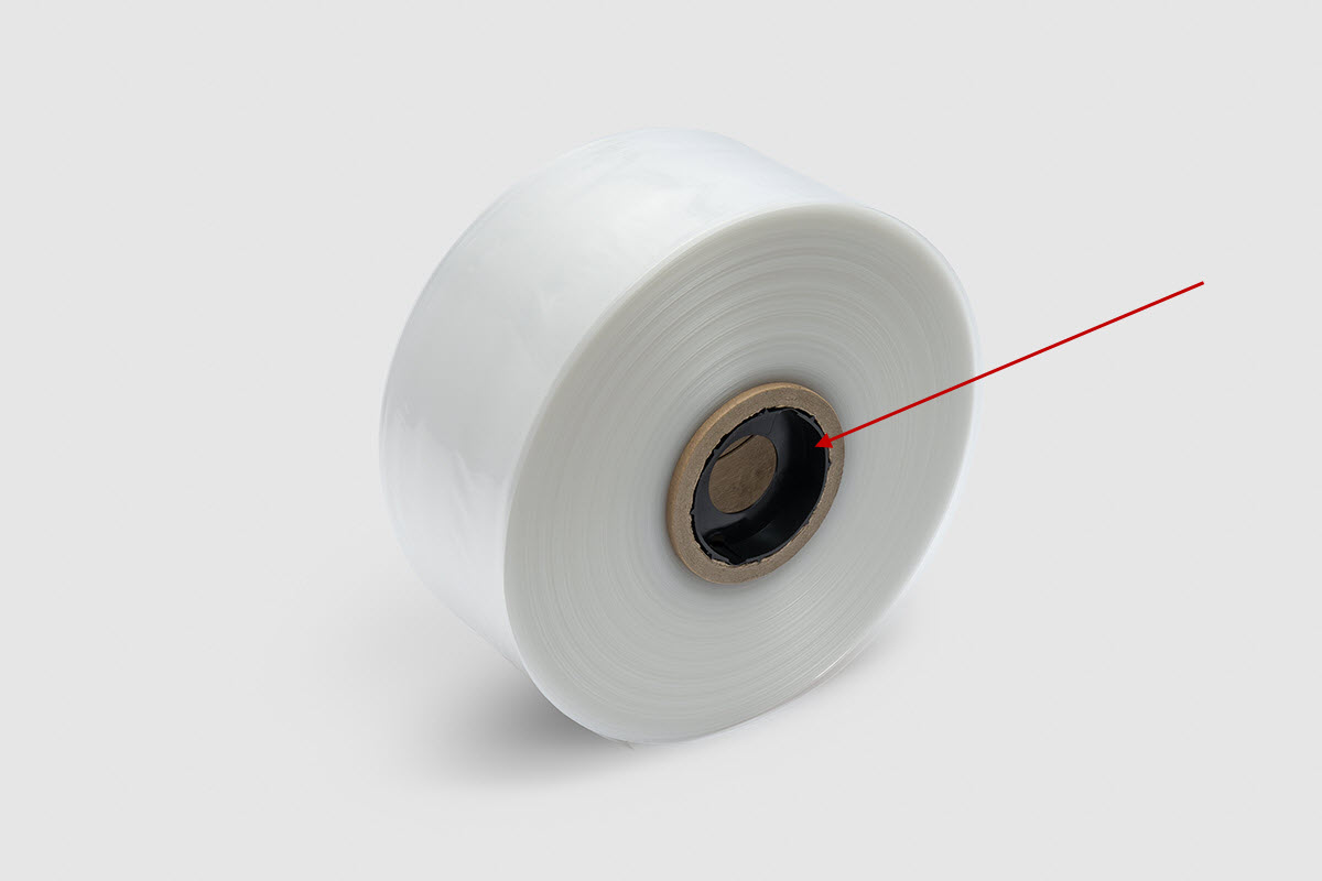 Film roll with plug-in bung in a 76 mm paper core