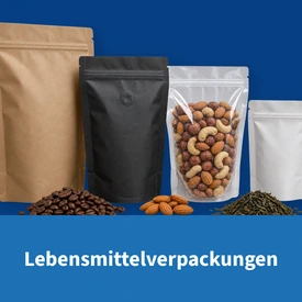 Food packaging: stand-up pouches made of kraft paper and film, one filled with nuts, in front of them coffee beans, almonds and tea